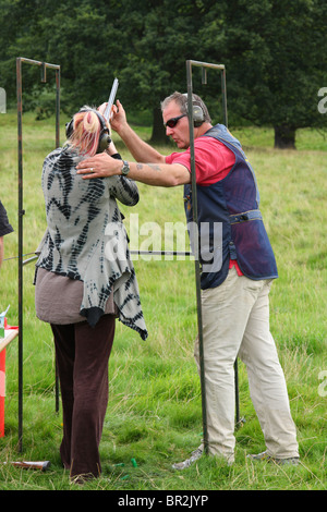 Clay pigeon shooting tuition at the Chatsworth Game Fair, Derbyshire, England, U.K. Stock Photo