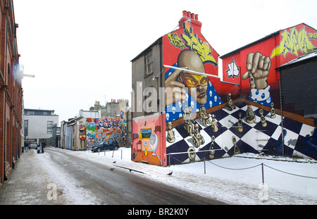 Urban graffiti on the walls of buildings in the trendy North Laines region of Brighton, East Sussex, England Stock Photo