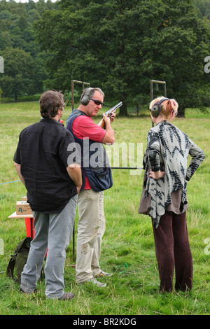 Clay pigeon shooting tuition at the Chatsworth Game Fair, Derbyshire, England, U.K. Stock Photo