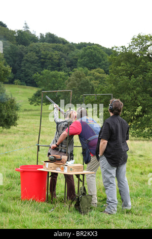 Clay pigeon shooting tuition at the Chatsworth Game Fair, Derbyshire, England, U.K. Stock Photo