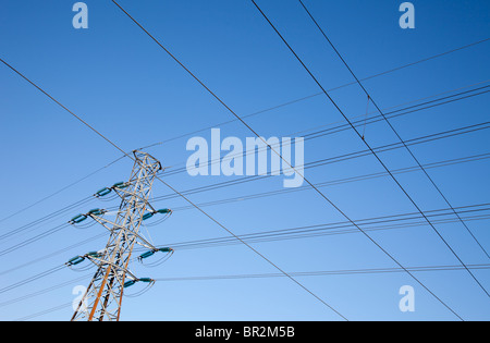 High-voltage power lines and metallic pylon , Finland Stock Photo