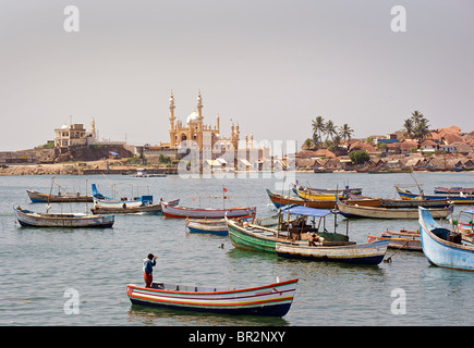 Fishing boats in harbour, coastal area of Vizhinjam, Trivandrum, Kerala, India Stock Photo