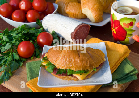 Croissant with Salami and Cheese Stock Photo