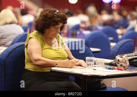 Mecca Bingo UK bingo company. People playing Bingo at Catford Bingo Hall, London, UK. Photo:Jeff Gilbert Stock Photo