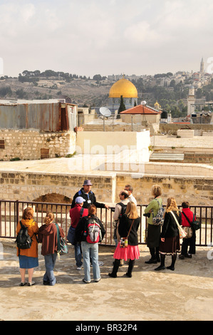 Tourist group during a tour on the roofs of old town Jerusalem, Israel, Middle East, the Orient Stock Photo