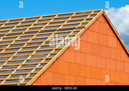 New bungalow pitched roof construction showing softwood pine timber battens - Indre-et-Loire, France. Stock Photo