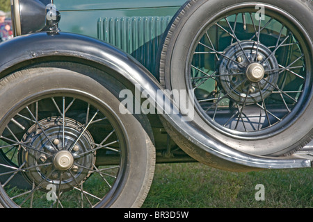 Front nearside wheel and spare wheel on a 1928 model A Ford Pick-up. Stock Photo