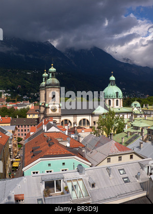 Innsbruck Saint Jacob's Cathedral (Domkirche zu St. Jakob) seen over the rooftops from the city tower Stock Photo
