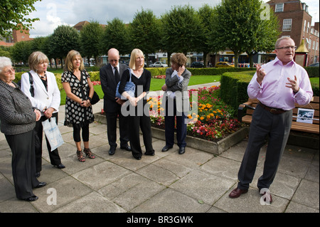 Local dignitaries unveil a memorial bench in memory of photographer Denis Williams in town centre of Welwyn Garden City Stock Photo