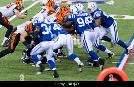 Cincinnati Bengals Vs. .Tennessee Titans. NFL Match Poster. Two American  Football Players Silhouette Facing Each Other On The Field. Clubs Logo In  Background. Rivalry Concept Photo. Stock Photo, Picture and Royalty Free