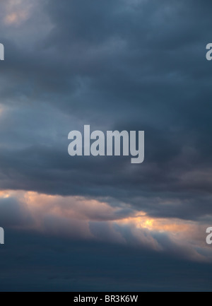 Colorful evening clouds at sunset Stock Photo