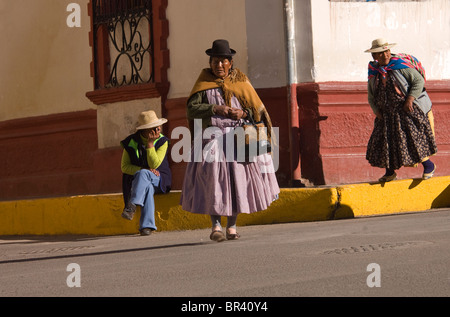 Ladies wearing traditional costume in Puno, Peru Stock Photo