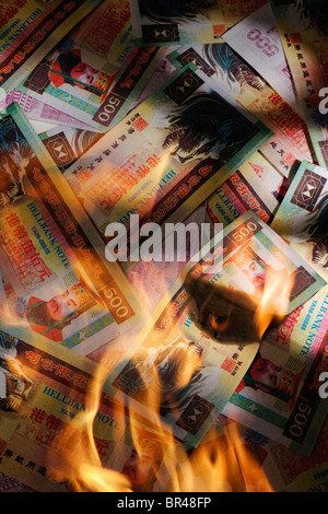 Chinese, Hellbank, joss paper money on fire. Stock Photo