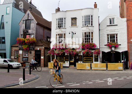 The Cricketers and The Black Lion pubs in The Lanes, Brighton (small motion blur on cyclists) Stock Photo