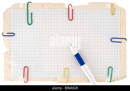 Checked notebook paper with a pen Stock Photo