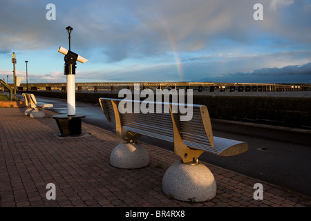 Rainbow, coastal telescope & seating at the River Tay road bridge and Stainless steel bench at the Riverside, Dundee Waterfront, Tayside, Scotland, UK Stock Photo