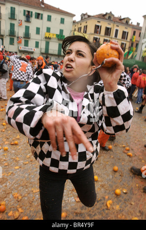 Ivrea Italy celebrates Carnivale with the Orange Battles when the town reenacts an ancient battle. Stock Photo