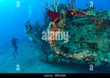 Female teen scuba diver Wreck of the RMS Rhone off the coast of Salt Island near Tortola British Virgin Islands Caribbean Stock Photo