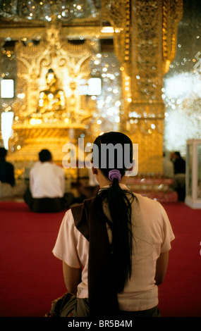 Burmese woman praying, Burma, Myanmar, Asia Stock Photo