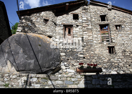 Typical stone houses detail streets in mountain village Espot in Sant Maurici National Park Pyrenees Spain Stock Photo
