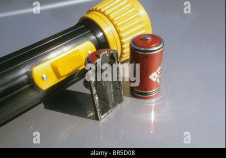 cutaway view dry cell battery flashlight size D electricity electric storage efficient emergency light tool chemical reaction Stock Photo