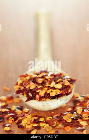 Chilli chili Flakes on Spoon Stock Photo
