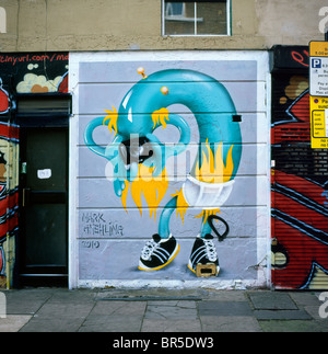 Mark Gmehling artwork painted on a wall in a street off Brick Lane Shoreditch London England  UK  KATHY DEWITT Stock Photo