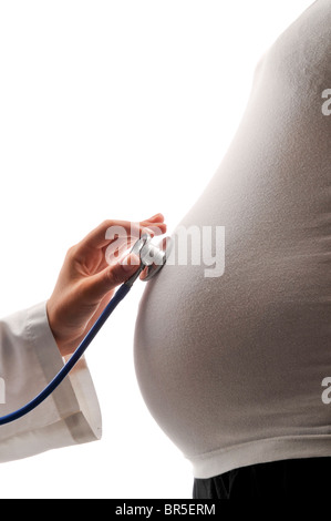 pregant woman with doctor stethoscope Stock Photo