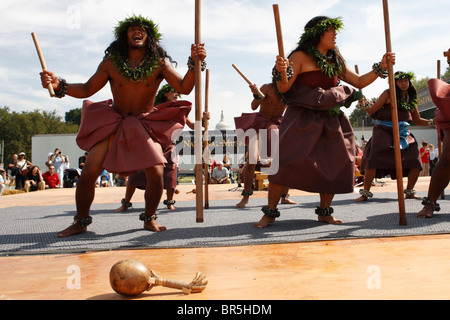 Members of the Hawaiian Halau O Kekuhi dance company perform at the First Americans Festival on the National Mall, Washington DC Stock Photo