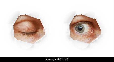 Eye in a hole - the closed and open variants on white background Stock Photo