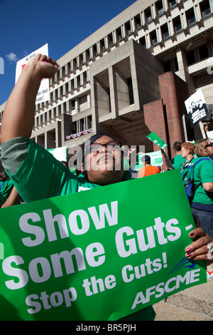 Members of the public employees union AFSCME rally against proposed cuts to social services and public facilities. Stock Photo
