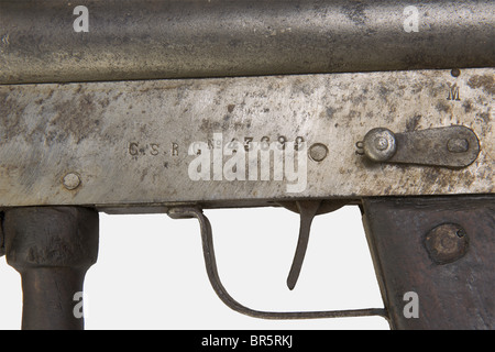 A French light machine gun 'Chauchat', calibre 8mm Lebel, serial number 43699. some parts missing, no blueing, lightly pitted, bipod, cocking handle and cartridge receivermissing. Stamped on the side of the frame 'C.S.R.G.', bolt and bolt stopping screw stamped 58901. The wood damaged by insect holes. historic, historical, 20th century, gun, guns, firearm, fire arm, firearms, fire arms, weapons, arms, weapon, arm, fighting device, object, objects, stills, clipping, clippings, cut out, cut-out, cut-outs, military, militaria, piece of equipment, Stock Photo