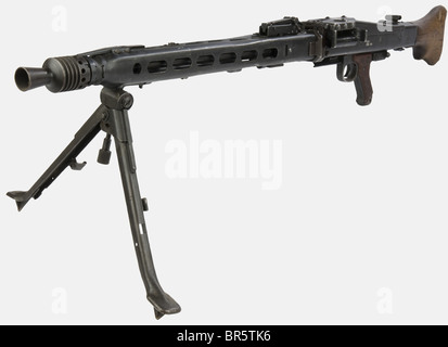 A German MG 42 machine gun, calibre 7,92 x 57, serial number 5044, stamped 'dfb'. Arsenal-restored machine gun (post-war) and reblued, with a bipod. historic, historical, 1930s, 20th century, gun, guns, firearm, fire arm, firearms, fire arms, weapons, arms, weapon, arm, fighting device, object, objects, stills, clipping, clippings, cut out, cut-out, cut-outs, military, militaria, piece of equipment, Stock Photo