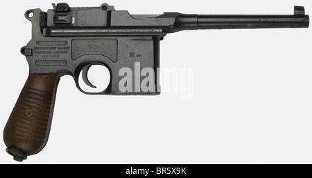 A German Mauser C96 pistol pattern 1930, calibre 7,63, serial number 917959. Mauser banner on the left side of the frame, a crowned "U" stamped on the barrel, original bluing, the grip panels with 12 grooves. The matching wooden stock also with Mauser banner. historic, historical, 1930s, 20th century, handgun, handheld, firearm, fire arm, gun, fire arms, firearms, guns, weapon, arms, weapons, arms, pistols, object, objects, stills, clipping, clippings, cut out, cut-out, cut-outs, Stock Photo