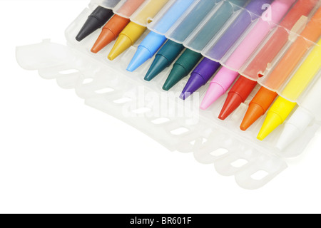 Multicolor crayons in plastic case on white background Stock Photo