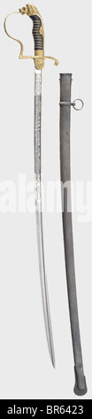 Generalmajor Hans Hüttner (1885 - 1956) - a sword awarded as a marksmanship prize, 1921, to the holder of the Knight's Cross. The Damascus pipe-back blade with yelmen is half nickel-plated and richly etched with vines and trophies against a blued background. Inscribed on the obverse side, 'Ehrenpreis für hervorrangende Schießleistungen 1921. Obltn. Hüttner I Rgt. 2.' (First Prize for Outstanding Marksmanship 1921. First Lieutenant Hüttner I Regt. 2), and on the back with the maker's inscription 'Weyersberg, Kirschbaum & Cie, Solingen' and the Bavarian proof mar, Stock Photo