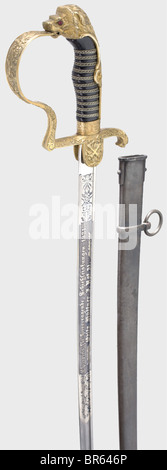 Generalmajor Hans Hüttner (1885 - 1956) - a sword awarded as a marksmanship prize, 1921, to the holder of the Knight's Cross. The Damascus pipe-back blade with yelmen is half nickel-plated and richly etched with vines and trophies against a blued background. Inscribed on the obverse side, 'Ehrenpreis für hervorrangende Schießleistungen 1921. Obltn. Hüttner I Rgt. 2.' (First Prize for Outstanding Marksmanship 1921. First Lieutenant Hüttner I Regt. 2), and on the back with the maker's inscription 'Weyersberg, Kirschbaum & Cie, Solingen' and the Bavarian proof mar, Stock Photo