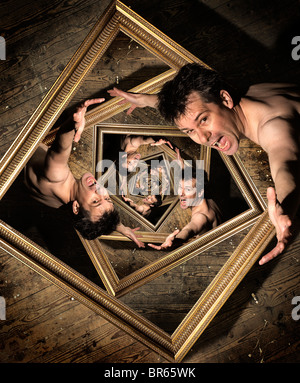 A Man Trapped in a Spiralling Frame Stock Photo