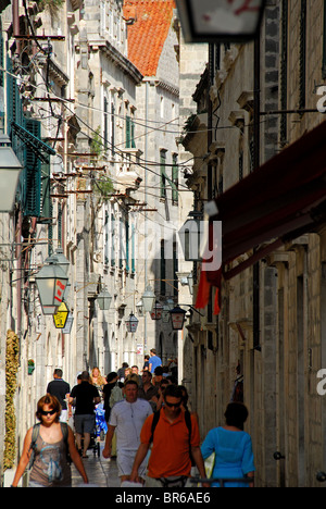 DUBROVNIK, CROATIA. Shoppers and tourists on the shopping thoroughfare of Od Puca in the old walled town. Stock Photo