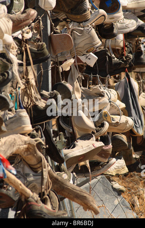 Close-up of shoes on a "shoe fence" Stock Photo