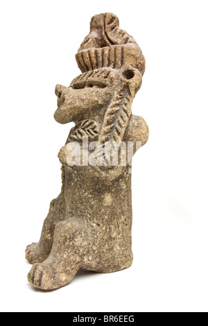 Eerie and ugly Mayan Statue isolated on white background. Stock Photo
