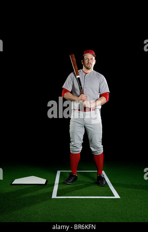 A baseball player, portrait, studio shot Stock Photo