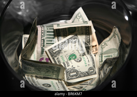 US bank notes in a container Stock Photo