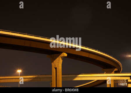 Low angle view of a highway overpass at night Stock Photo