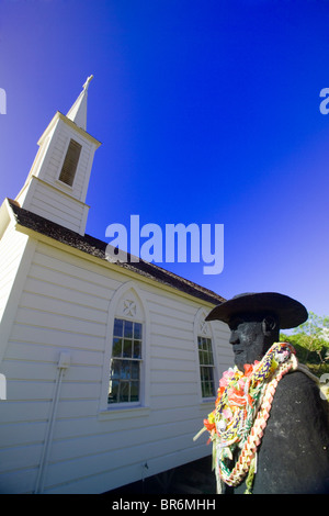 A statue of Father Damien outside St. Joseph's Church on the Pacific island of Molokai Hawaii. Stock Photo