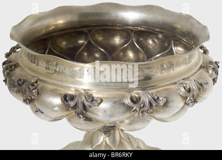 Friedrich Christiansen, the most successful naval aviator in World War I, - 'Honour award given by His Majesty King Ludwig III of Bavaria Prinz Heinrich Flug 1914'., Silver with traces of gilding, hand-hammered, made of two pieces, with applied scrolling leaves. Below the edge a dedication engraving, the base with the hallmark '800'. Height 16 cm, weight 846 g. Prince Heinrich of Prussia became a DLV pilot on 28th Nov. 1910 and established the Prinz Heinrich Flug, a reliability test, in 1911. In May 1914 the flight went from Darmstadt over Frankfurt and Hamburg, Stock Photo