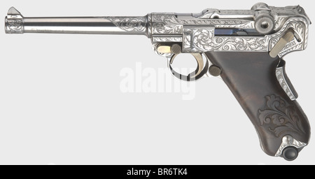 A Mauser Parabellum mod. 06/73, engraved, in its leather case, 9 mm Parabellum cal., no. 01. Mirror-like bore, barrel length 140 mm. Grip safety. Ornamental and vine engraving on all parts against a polished background. Small parts blue and yellow. Carved precious wood grip panels. Magazine matt chromed. New condition. Comes with accessory reddish brown Mauser leather case, dimensions 47 x 32 x 7 cm, inlaid with green velvet. Included: two blued spare magazines with wooden base, manual and case key. Erwerbsscheinpflichtig. historic, historical, 1970s, 20th cent, Stock Photo