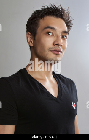 A studio portrait of a young man Stock Photo