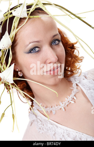 Portrait of a young woman with white flower Stock Photo
