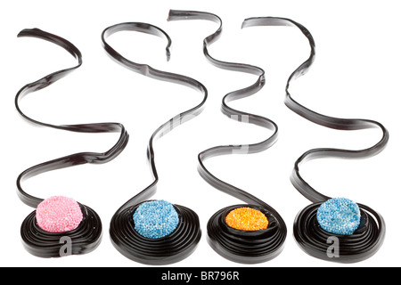 Four liquorice catherine wheels Stock Photo
